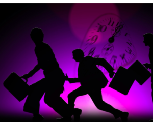 Silhouette of people with briefcases dashing by a ghostly clock.